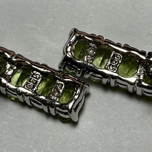 Sterling Silver Stud Earrings with Faceted Peridot Stones l 9/16 inch long - Picture 8 of 10